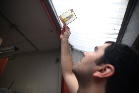 Ian McDermott looking at an image