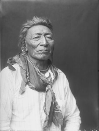 Richard Throssel. Bull Tongue in Partial Native Dress. 1910.