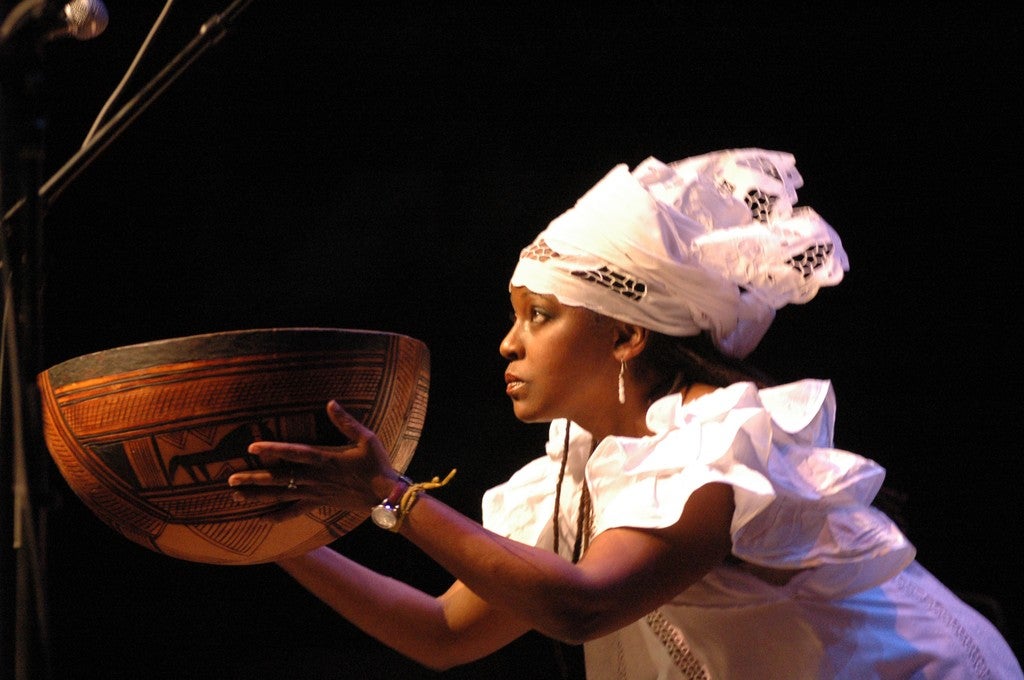 Woman with gourd, Kwanzaa Celebration
