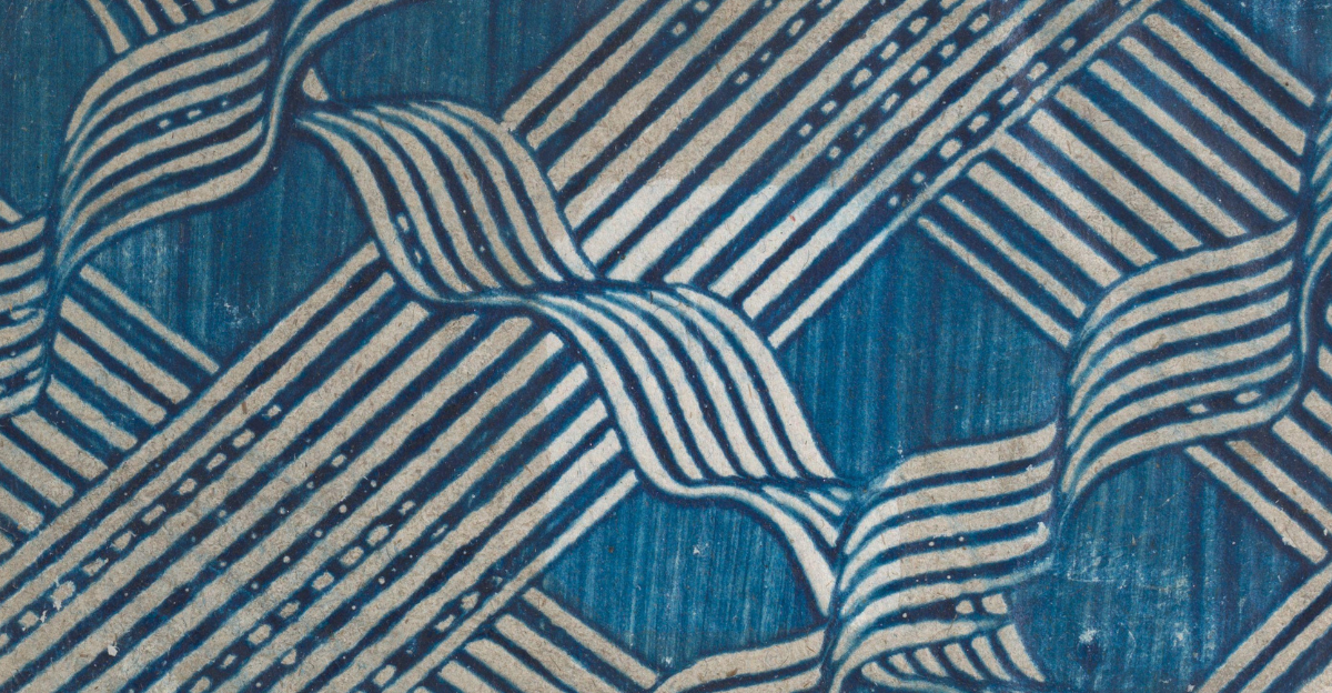 Close-up of a marbled paper design in blue and cream, featuring diagonal bands of stripes intersected by wavy ribbon-like patterns.