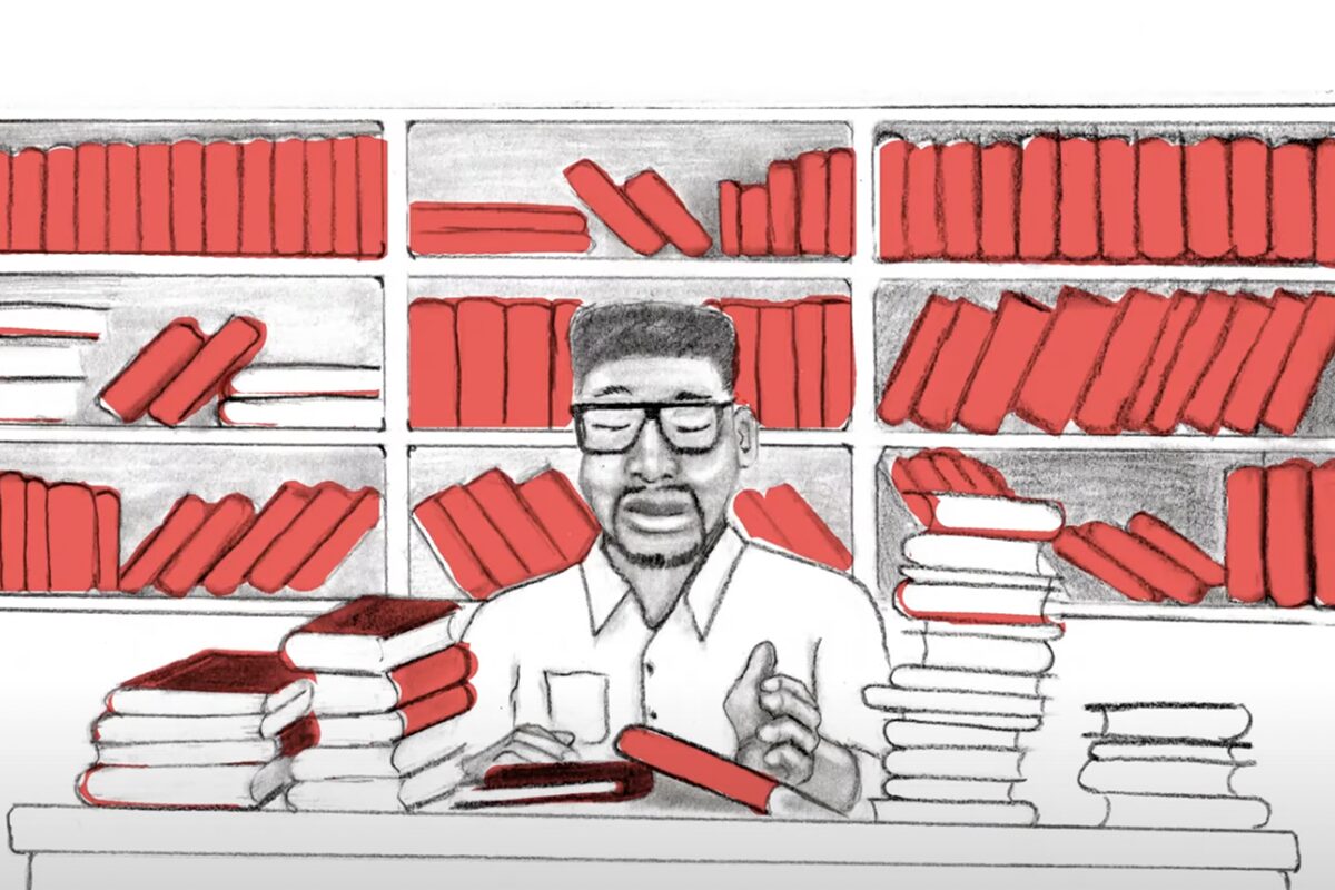 A hand-drawn illustration of a person with glasses sitting at a desk, surrounded by stacks of red books, with shelves of more red books behind them.