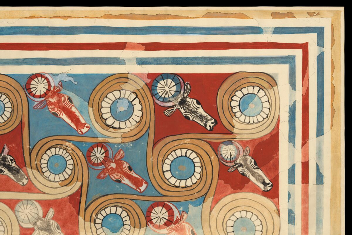 Colorful painted design featuring repeating spirals and stylized cow heads in red, black, and white. The geometric pattern is bordered by layered stripes in red, blue, and beige, with visible wear and cracks throughout the artwork.